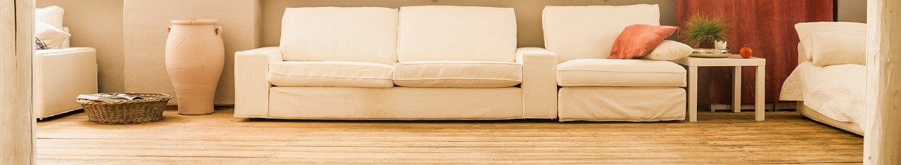 Living room with a sofa and hardwood floor